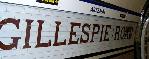 Sign reading Gillespie Road and Arsenal.