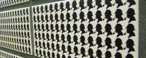 The tiles at Baker Street, with tiny silhouettes of Sherlock Holmes