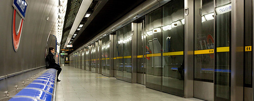 Someone sitting in Bermondsey tube station.