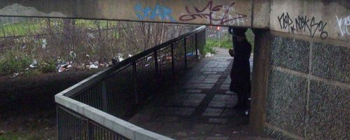 Someone standing under a flyover near Brent Cross.